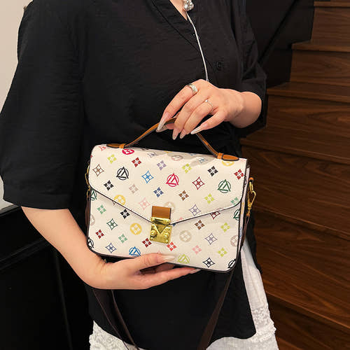 A captivating blend of classic and modern styles, these handbags are truly enchanting.