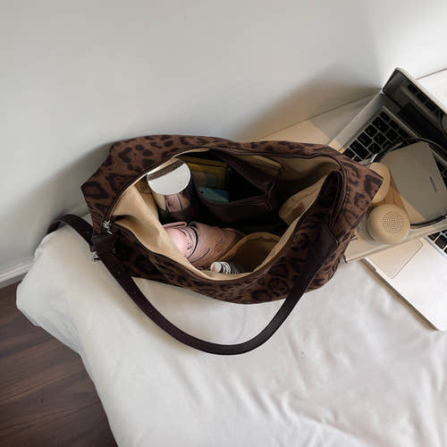 Leopard print suede shoulder bag