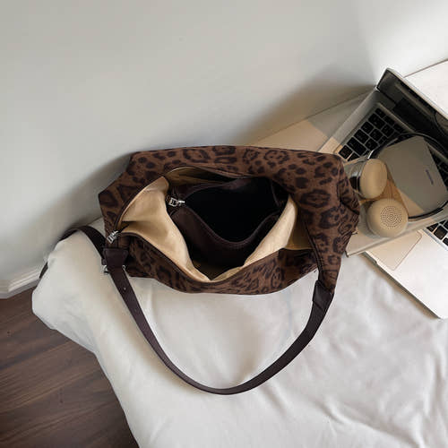 Leopard print suede shoulder bag
