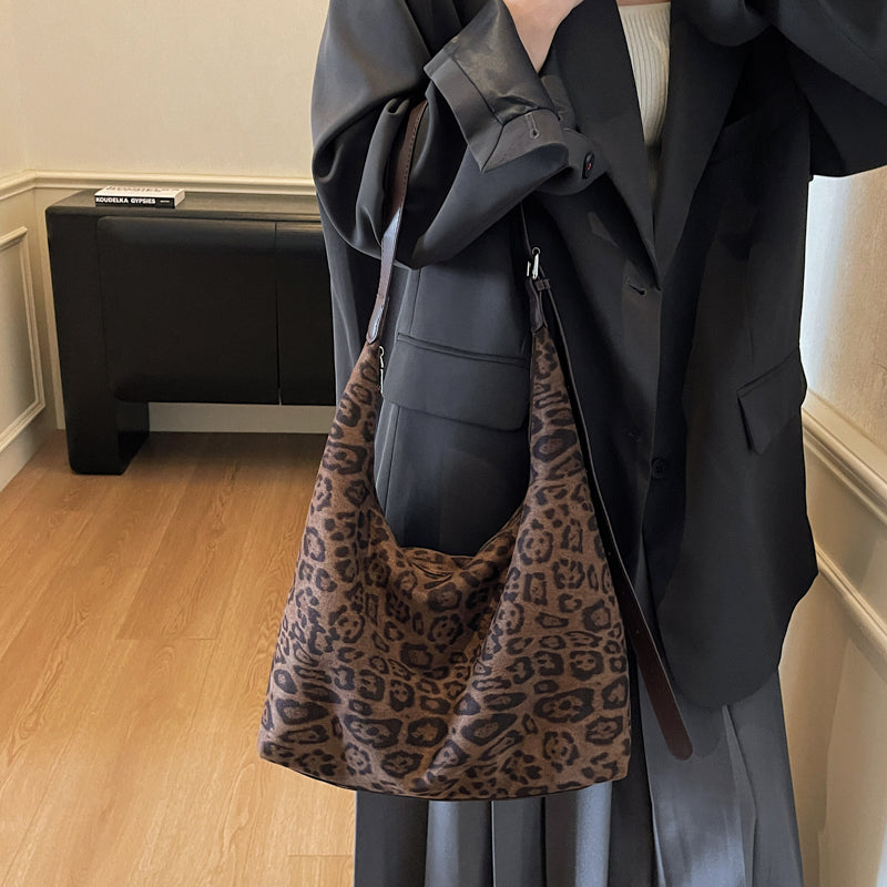 Leopard print suede shoulder bag