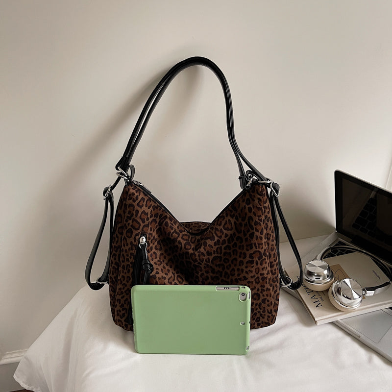 Suede tote bags, shoulder bags, and backpacks.