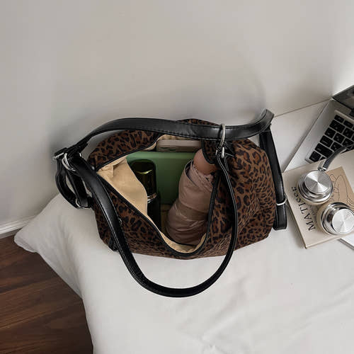 Suede tote bags, shoulder bags, and backpacks.