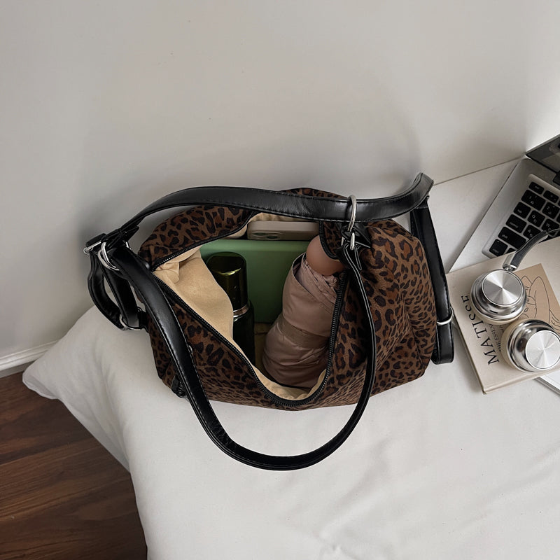 Suede tote bags, shoulder bags, and backpacks.