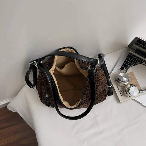 Suede tote bags, shoulder bags, and backpacks.