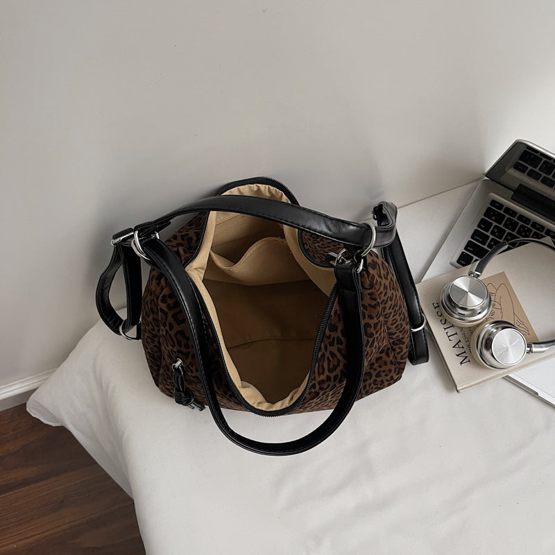 Suede tote bags, shoulder bags, and backpacks.