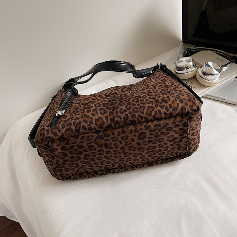 Suede tote bags, shoulder bags, and backpacks.