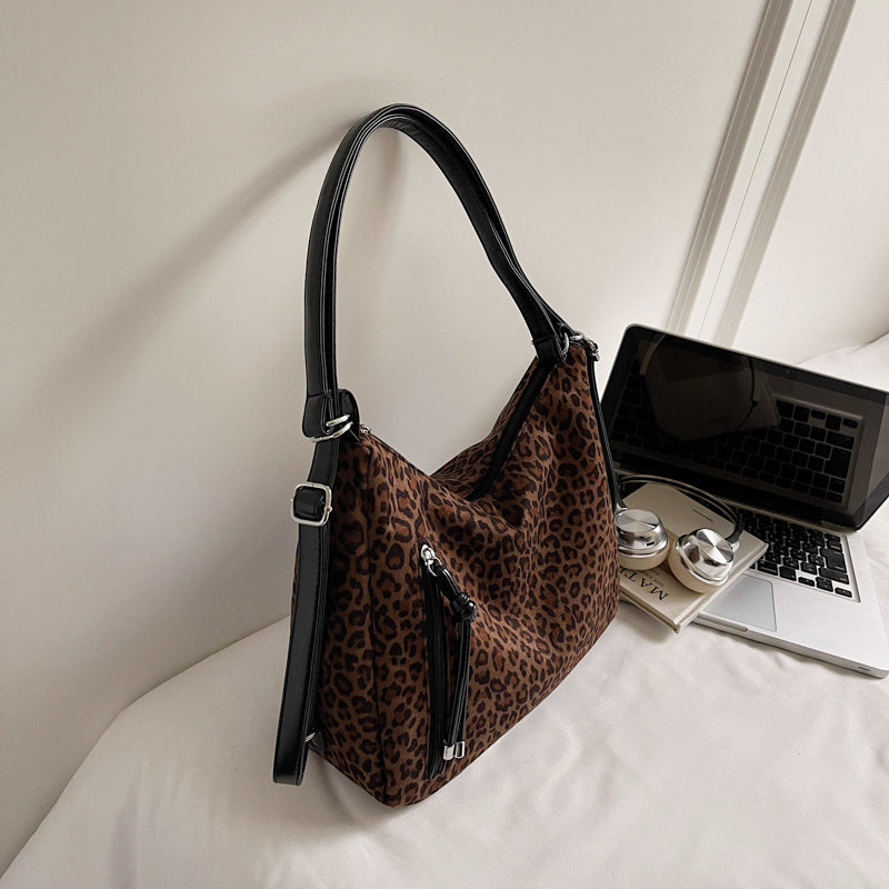 Suede tote bags, shoulder bags, and backpacks.